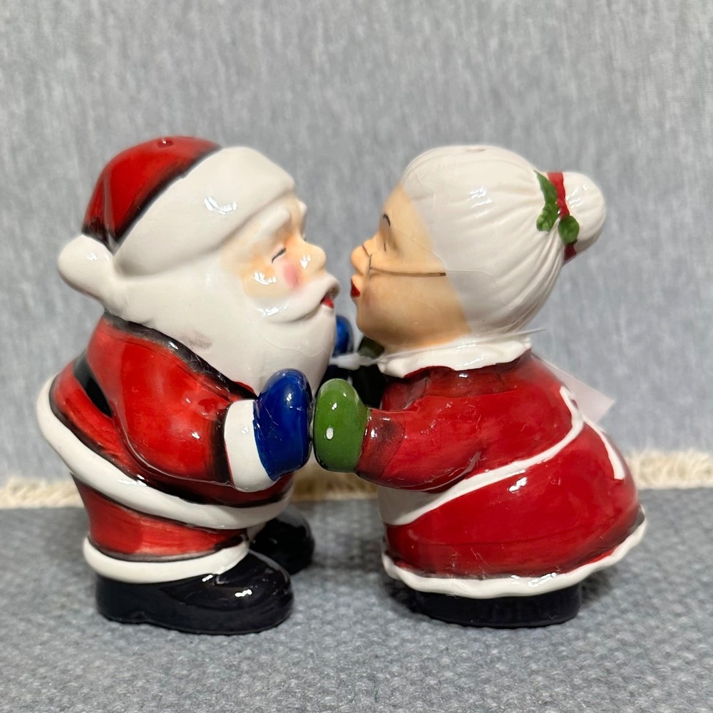 Collections Etc Magnetic Kissing Santa and Mrs Claus Salt and Pepper Shaker Set